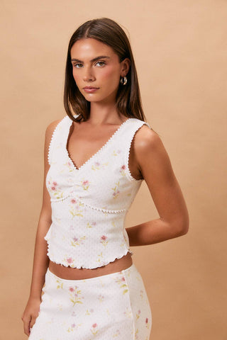 Top sans manches à encolure V avec bordure en dentelle et pointelle
