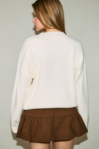 Pull oversize à col rond et manches longues « cockapoo »